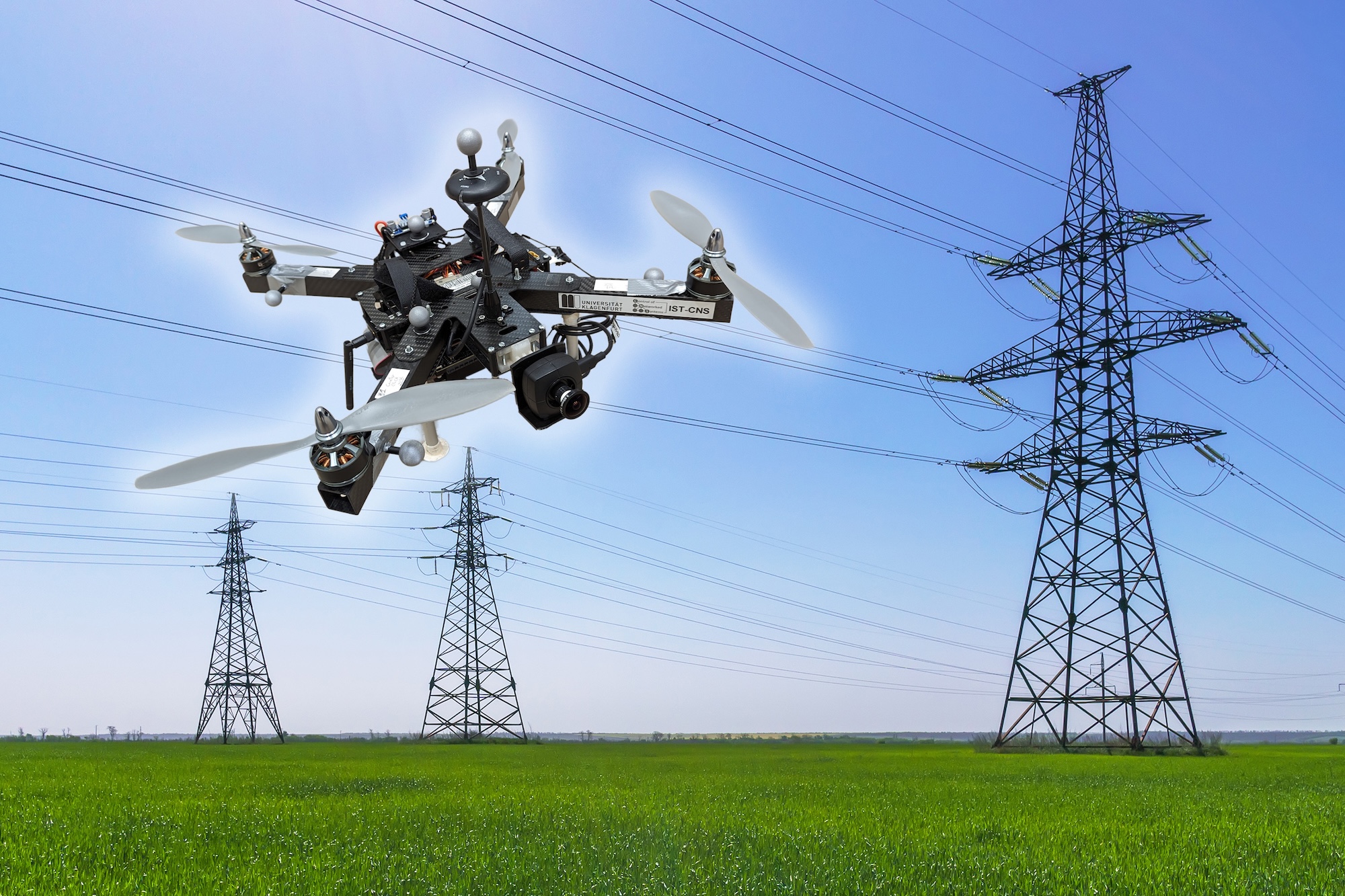 Drone in front electricity towers